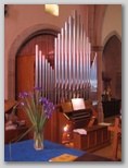Rosy glow on organ Sunday morning