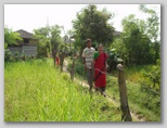 e1_urmila___her_son_in_their_village.jpg